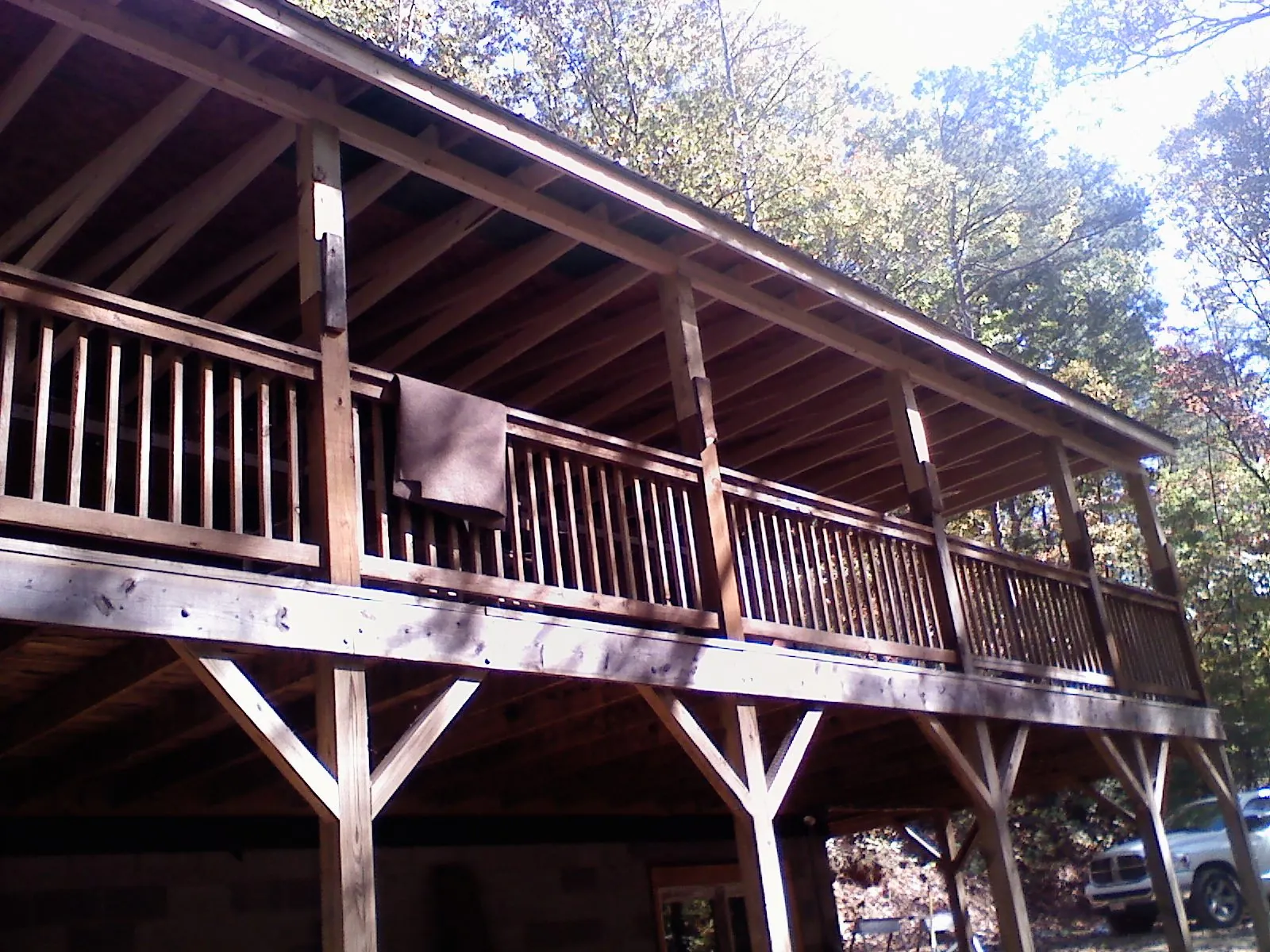 Timber framing under a new elevated porch and deck — Roof Leak Repair in Milpitas by Roofing Brothers